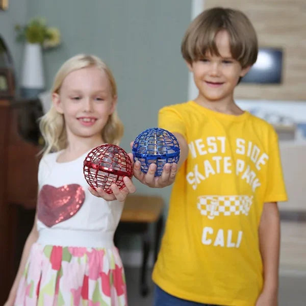 Two kids holding Wonder sphere ball in hand